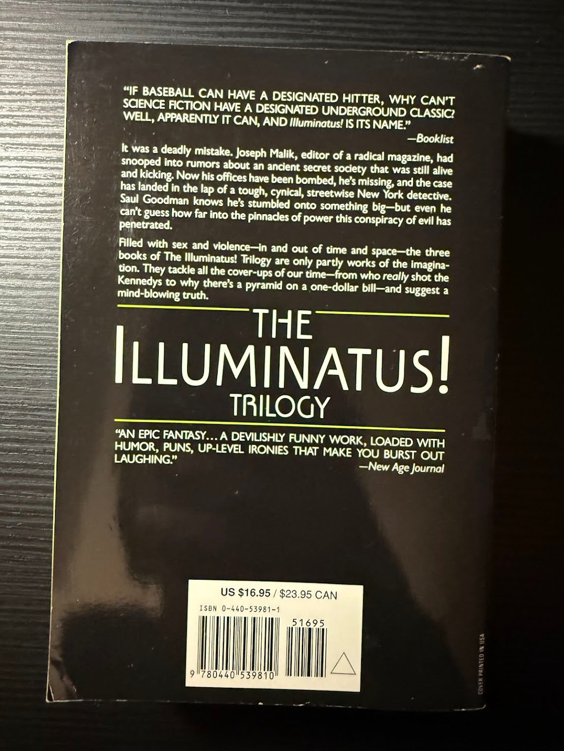 The Illuminatus Trilogy by Robert Shea and Robert Anton Wilson