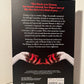 The Woman in Black by M.Y. Halidom