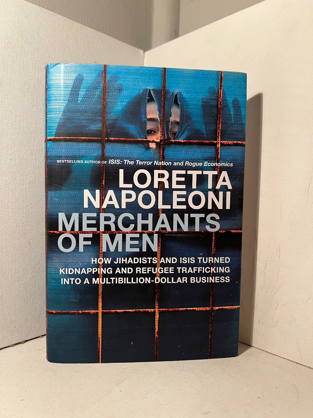 Merchants of Men by Loretta Napoleoni