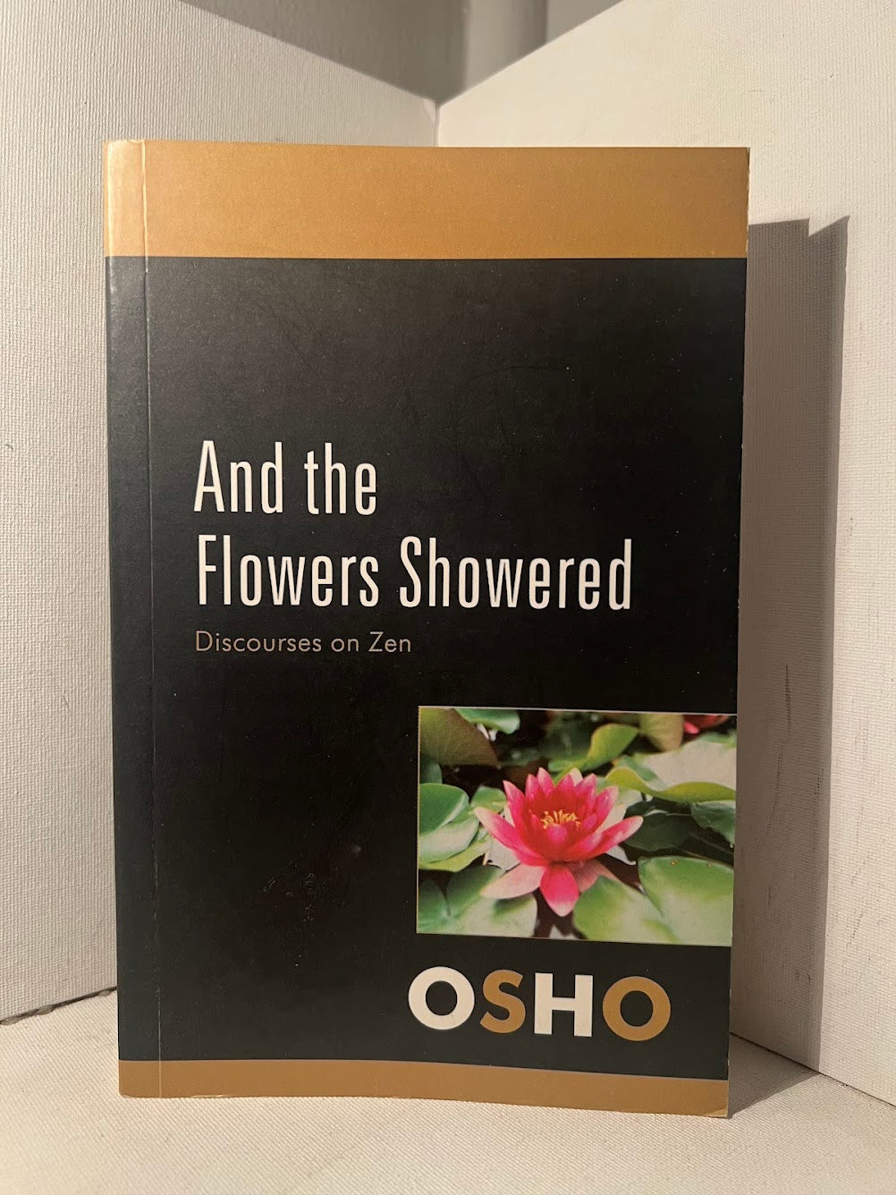 And the Flowers Showered by Osho