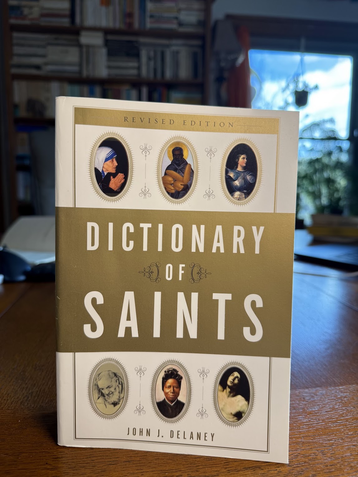 Dictionary of Saints by John J. Delaney