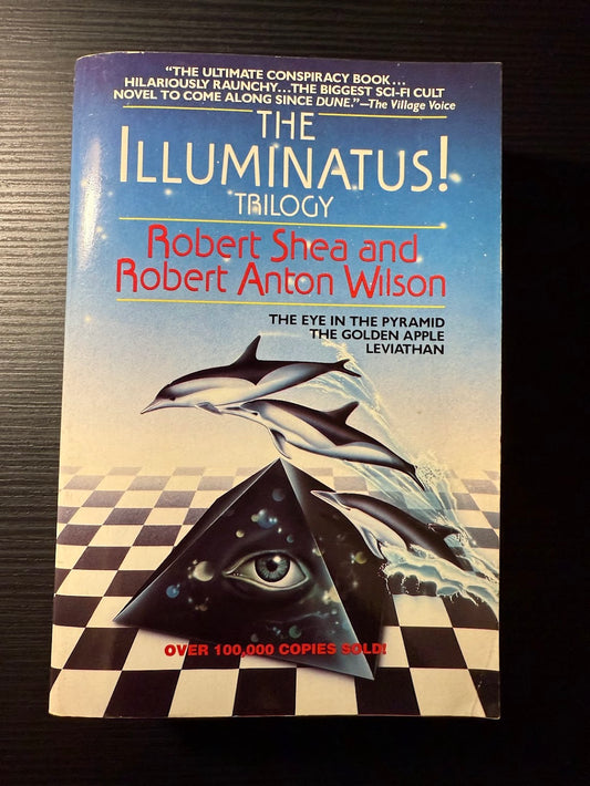 The Illuminatus Trilogy by Robert Shea and Robert Anton Wilson